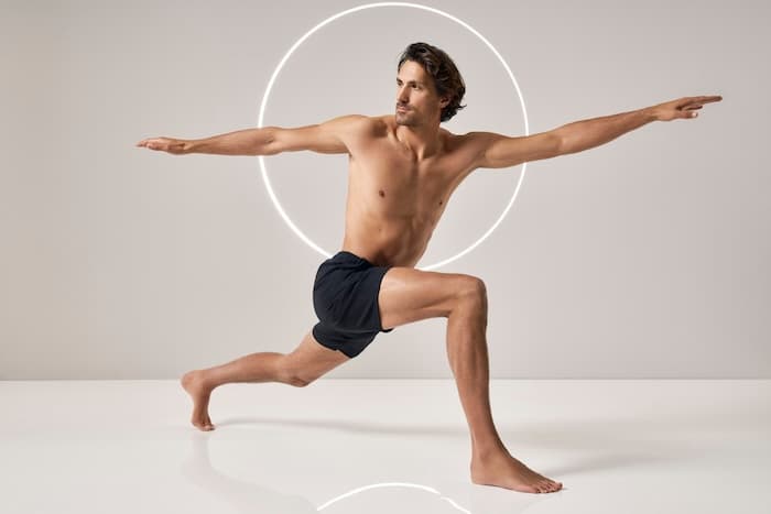 A man stretching, illustrating the recovery and circulation focus of LPG wellness treatments